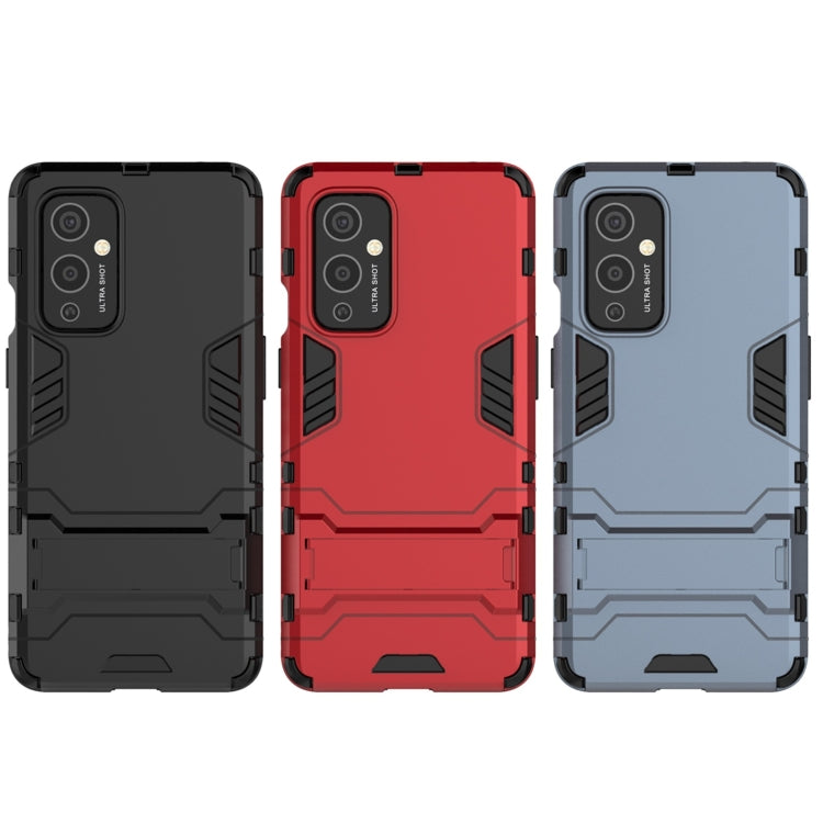 PC + TPU Shockproof Protective Case with Holder, For OnePlus 9, For OPPO Reno5, For OPPO Reno5 Pro, For OnePlus 9 Pro, For Xiaomi Redmi Note 9 4G, For Xiaomi Redmi Note 9 5G, For Xiaomi Poco M3, For Samsung Galaxy A32 5G, For Samsung Galaxy A12 5G