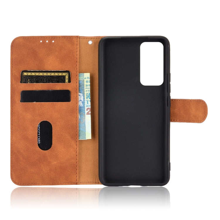 Solid Color Skin Feel Magnetic Buckle Horizontal Flip Calf Texture PU Leather Case with Holder & Card Slots & Wallet