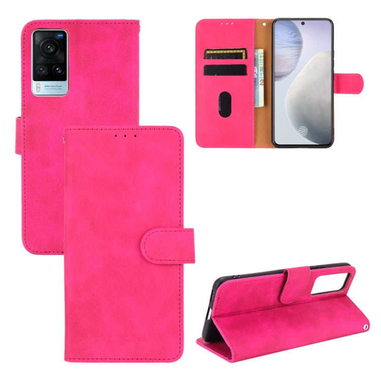 Solid Color Skin Feel Magnetic Buckle Horizontal Flip Calf Texture PU Leather Case with Holder & Card Slots & Wallet