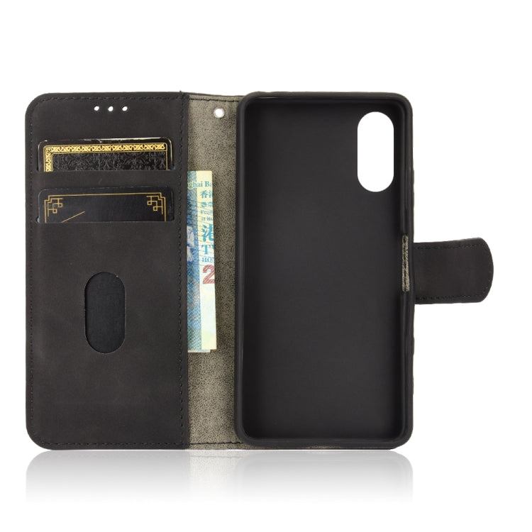 Solid Color Skin Feel Magnetic Buckle Horizontal Flip Calf Texture PU Leather Case with Holder &amp; Card Slots &amp; Wallet, For Sony Xperia Ace II