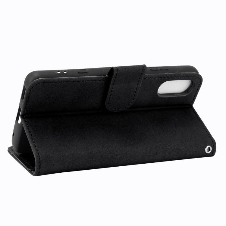 Solid Color Skin Feel Magnetic Buckle Horizontal Flip Calf Texture PU Leather Case with Holder & Card Slots & Wallet, For Sony Xperia Ace II